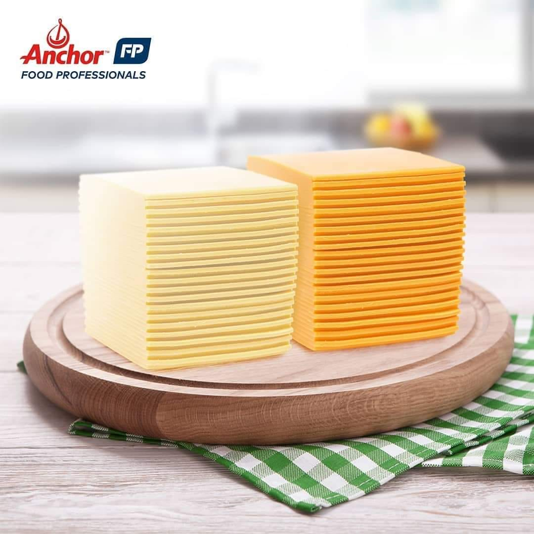 Anchor processed Colored CHEDDAR SOS 84 Sliced Cheese 1kg - Burger Slices